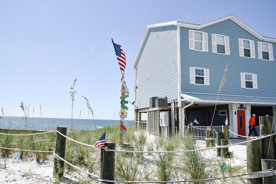 This amazing construction withstood a Cat 5 hurricane.  It has been beautifully redone with major top of the line upgrades to kitchen and baths.  Custom built cabinets in all. This gulf front stunner will not disappoint.  There are three balconies to enjoy the amazing views. Chef's kitchen to cook for your loved ones, lots of entertaining space and tons of storage.  There is a kitchen on the main level and guest quarters upstairs. 2 laundry rooms. This home is the perfect oasis to enjoy the serenity of Mexico Beach.  There is private beach access and an extra 15 feet of access being the end unit.  You can truly enjoy entertainment areas on each level.  This gorgeous home won't last long.  Schedule your private showings today!! All room sizes to be verified by buyer.