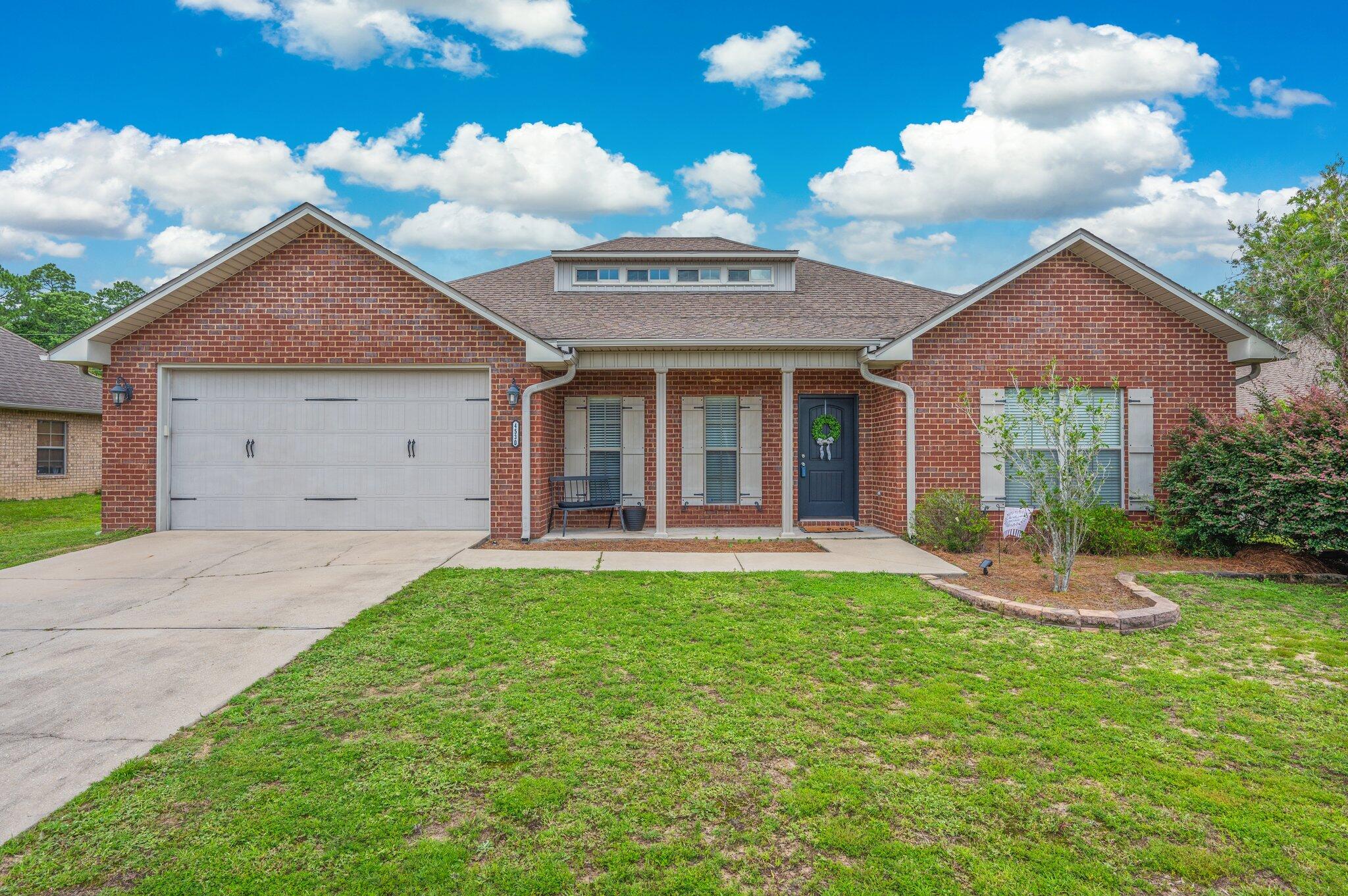 Welcome to this stunning 5-bedroom, 2.5-bath all-brick home tucked away on the southern edge of Crestview in Kaitlyn's Preserve just minutes from local military bases and I-10 for an easy commute.This home has it all! From the spacious livingroom to the formal dining room w/decorative accent wall, this home is sure to impress. The kitchen offers granite countertops, tile backsplash, island, stainless steel appliances and barstool seating. Upstairs there is a bonus area w/ half bath that is great for entertaining! The primary suite is spacious and the bathroom boasts a double vanity w/ granite countertop, soaker tub, and a walk-in tiled shower. Head out back to enjoy your fenced in back yard! Schedule your showing today!