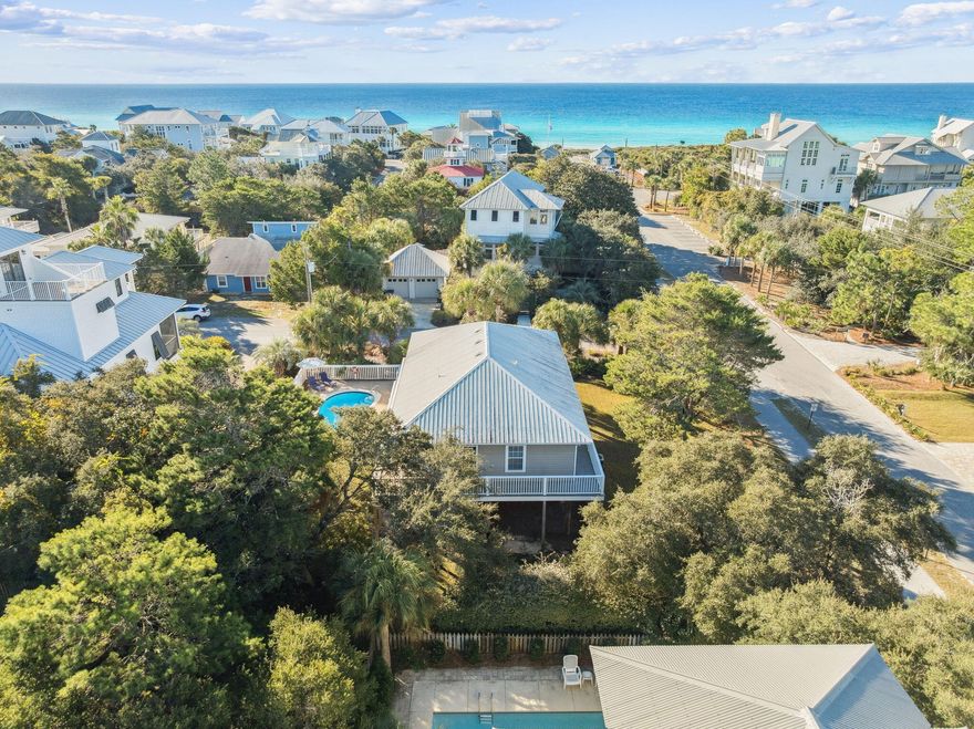 15 Betty Street offers an inviting blend of coastal charm, privacy, and ideal beach access. Set on a generous 1/3 acre corner lot, this well-loved cottage is just a short two-minute stroll from Gulfview Heights Beach access. Designed for effortless coastal living, the home features a bright, open layout with abundant natural light and a seamless connection between the living, dining, and outdoor spaces. Both bedrooms are true en-suite, offering comfort and privacy for owners and guests alike. Sleeping arrangements include a king suite, a queen suite, and built-in twin bunks. The outdoor setting is a standout. Surrounded by mature tropical landscaping, the property showcases a private 13' x 26' heated pool, along with spacious patio areas perfect for relaxing or entertaining. The oversized lot provides excellent separation from neighboring homes and creates meaningful opportunity for future expansion or additional outdoor living space. Gulfview Heights Beach Access, one of 30A's most convenient access points with restrooms, showers, and a shaded pavilion. Situated near Draper Lake, one of Walton County's rare coastal dune lakesan ecological feature found in only a handful of places around the world. This prime 30A location offers unmatched walkability to many of the area's most popular dining and entertainment spots, including Shunk Gulley, Local Catch, Goatfeathers, Stinky's Fish Camp, boutique shops and seasonal events at Gulf Place. Scenic bike paths, state parks, and nature preserves surround the area, offering endless outdoor enjoyment. With a private heated pool, generous lot with room to expand, and immediate proximity to the beach, 15 Betty Street presents a rare opportunity to own a true coastal retreat in one 30A's most desirable neighborhoods.