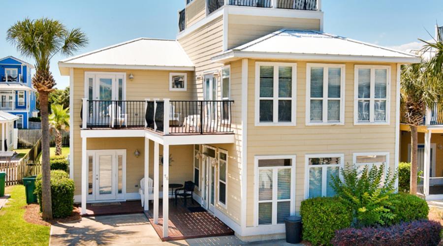 Gulf view, 80 yards from beach, used as rental property, Gross incomes: 2019: $99,070; 2020: $70,136 (through end Aug). Crystal Beach neighborhood, close proximity to restaurants, spa, cafe, markets, groceries. Great place for family vacations. Buyer to be given exterior complete painting allowance. Current owner to pay for this in full.
