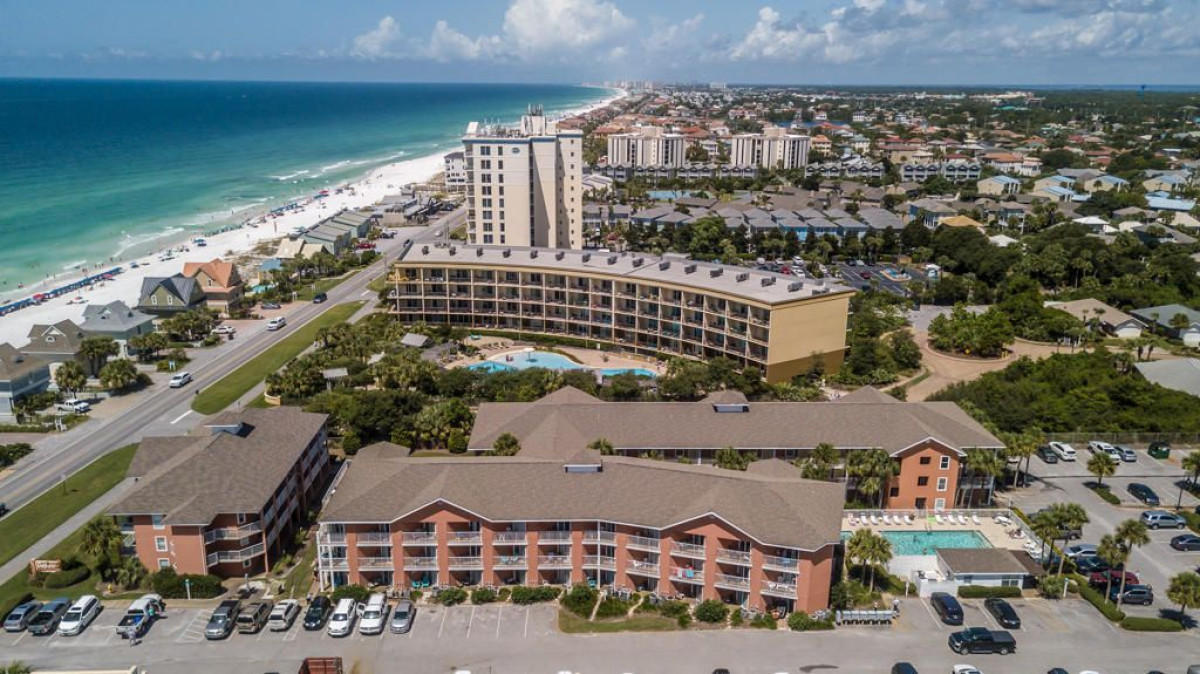 Location, location, location! Freshly remodeled ground floor condo with peek a boo views of the gulf from the patio and living room and no stairs to climb. Beautiful 1 bedroom with built in hallway bunks. Master bedroom has a brand new King size bed, wall mounted TV and crown molding. The kitchen features white cabinetry, light colored granite counter tops & stainless steel appliances. The bathroom has a custom tile shower and a new granite top vanity. New HVAC system. It's professionally decorated and comes fully turnkey to be your new beach getaway. This condo will be a rental machine with upwards of $35,000 in rental potential. Gulfview condos has its own private beach with gated access as well as 2 pools and a hot tub and grilling area which are just outside the front door of unit