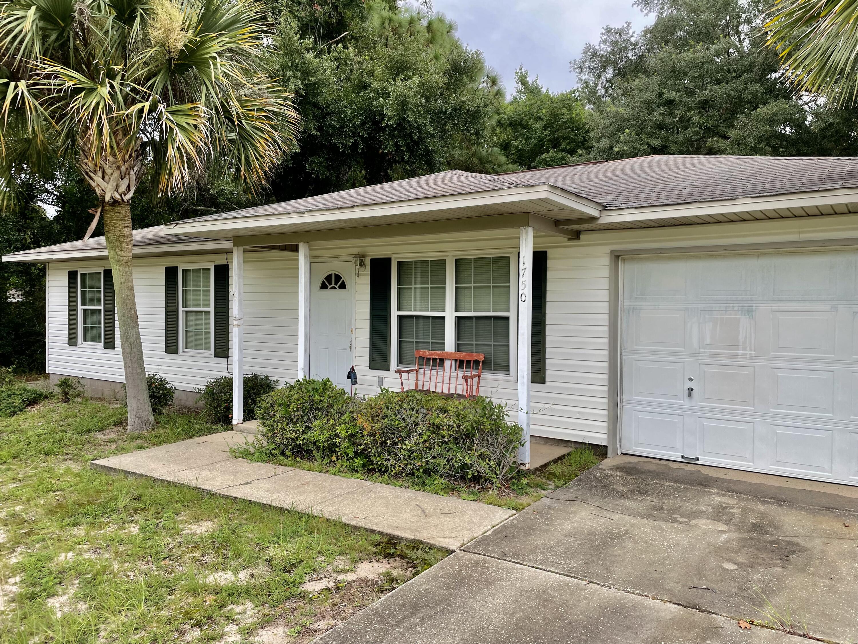 The roof is 25 years old the HVAC is 17 years old we don't know how old the water heater is the carpet needs to be replaced and it smells like smoke. This house will not qualify for a typical mortgage unless it is a renovation loan.