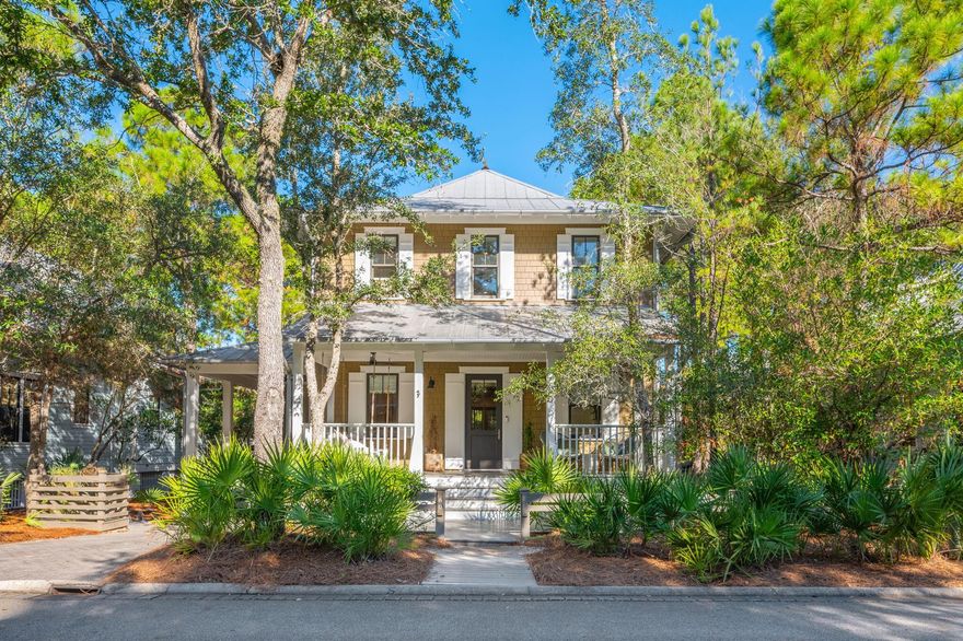 This pristine, fully remodeled home is located in one of the most desired locations for families in WaterColor, close to Camp WaterColor, yet also enjoys the privacy of a secluded oversized pool and hot tub oasis bordering a serene nature preserve. With over 1,000 sq ft of large screened porches, balconies, and an open porch with a cozy fireplace, outdoor dining and gas bbq, this charming home effortlessly blends indoor and outdoor living, offering a perfect retreat to create lasting memories year round. Fully furnished with a relaxed boho beach design, this home showcases meticulous attention to detail from custom designer window treatments to exquisite lighting setting an atmosphere of understated sophistication. The main floor features a stunning two-story foyer leading to an expansive open living area, dining room, and chef's kitchen which seamlessly extends your living space into the spacious screened porch featuring a comfortable seating area and ping pong table, all overlooking the oversized pool and hot tub. The kitchen boasts a large custom island centerpiece with quartz countertops, custom inset shaker cabinets, stainless steel appliances including a Thermador gas stove, pantry, and a separate wet bar with icemaker.  The living room features real wood-beamed ceilings and inviting fireplace. The downstairs includes a comfortable king bedroom with an ensuite bathroom, while the second floor offers another scrumptious king bedroom with a private bath, a custom bunk room with four twin beds and a private bath, and a luxurious king primary suite with a sitting area (or office), private spa like bathroom with a modern free standing soaking tub, separate shower with designer tile inlay, double sinks with white quartz counters, and a large screened porch complete with a hammock, perfect for relaxation. This enchanting home is ready to move in as a primary residence, second home, or a lucrative investment property with potential for over $260,000 in rental income. Included in the HOA dues, owners and guests have access to all the world class amenities of WaterColor including the WaterColor Beach Club, a stunning gulf-front club that offers everything you need for a luxurious beach day. It features three pools, three restaurants, towel and beach chair service, and multiple floors of seating with unobstructed views of the Gulf. Watercolor also has its own private beach providing an exclusive seaside experience. At Camp Watercolor, you can enjoy a lazy river, as well as two additional pools with water slides for extra fun. The camp includes a restaurant and bar, and it overlooks a large green space perfect for soccer or other outdoor activities. In addition to these, the Watercolor community boasts three more pools throughout the area. For tennis enthusiasts, Watercolor Tennis offers five clay courts and two pickleball courts along with a pro shop and daily clinics and lessons. Watercolor is also home to the Boathouse located on Western Lake, a rare coastal dune lake, offering fitness classes and kayak, paddle board, and foil board rentals for outdoor water activities. WaterColor owners and guests also enjoy easy access to the Idyllic town of Seaside for additional shopping, dining and entertainment.  Don't miss this opportunity. Call to schedule your appointment today!