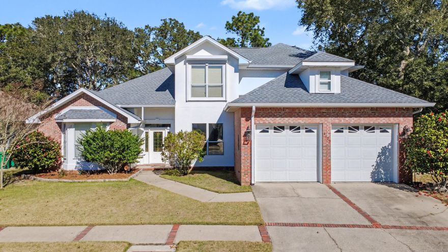 GOLF COURSE HOME IN ROCKY BAYOU! This beautifully updated 4 bedroom, 2.5 bath home showcases breathtaking, panoramic views of the Rocky Bayou Golf & Country Club, visible from the great room, kitchen, and master bedroom. Newer tinted, impact-resistant windows across the back fill the home with natural light, while a dramatic vaulted ceiling opens to the second floor and creates an airy, expansive feel. Enjoy your backyard views from the covered patio, and the adjacent greenspace provides added privacy and a serene, park-like setting with minimal yard maintenance. The interior and exterior have been freshly painted, including durable waterproof exterior paint.  The home offers abundant storage throughout. The first-floor master suite features a newly updated bath with a tiled shower and separate tub, while the second floor bedrooms are spacious with new oak closet cabinetry, and one of the bedrooms provides access to the walk-in attic closet. There are two offices, one on each level of the home. The main living area is open and inviting, highlighted by soaring ceilings, a gas fireplace, built-in bookcases, media space, and a built-in bar with cabinetry. The kitchen features granite countertops, a breakfast bar, a breakfast nook, and all-new appliances that convey (the current range is electric, but there is also plumbing available for a gas stove), PLUS a separate, formal dining room. The gigantic laundry room includes two pantries, additional cabinetry, and space for an extra refrigerator and freezer. The oversized 690sf garage features 2 separate bays and a large workshop area. There are two separate heating/air controls for each level.  Other features include new roof shingles, roll-down hurricane shutters across the front of the home and hurricane sheets for the remainder of the home, leaf guard gutters, and a whole-house gas generator in the event of power loss, making this home as functional as it is stunning. (Professional photos and videos to be uploaded soon.)