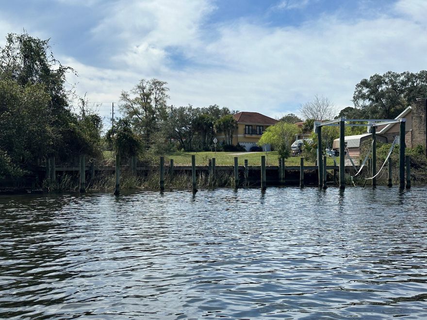 Modern Waterfront Marvel with Dock, Boat Slip, & Luxe Details!Welcome to the pinnacle of coastal luxury living! This brand-new modern masterpiece is a showstopper inside and out--offering 4 spacious bedrooms, 3.5 lavishly appointed baths, and direct waterfront access with dock and boat slip.Step inside and feel the difference--crafted with 2x6 construction, impact-rated windows and garage doors, and soaring 8' solid core interior doors throughout. Every inch of this home radiates upscale elegance and cutting-edge design.The heart of the home features an open-concept living space bathed in natural light with LED recessed lighting, gas appliances, and sleek finishes made for entertaining. The chef's kitchen flows seamlessly into the living and dining areas with panoramic water views as your backdrop.

Retreat to the waterfront primary suite, your private sanctuary, where mornings begin with serene water vistas and evenings end in a spa-like oasis. Indulge in the stand-alone, double-entry "love-making" shower, soak in the free-standing tub, and enjoy luxury redefined.

With a 3-car garage, gas amenities, and every modern detail meticulously designed-this home is not just built to impress, it's built to last.

Live bold. Live waterfront. Live modern.