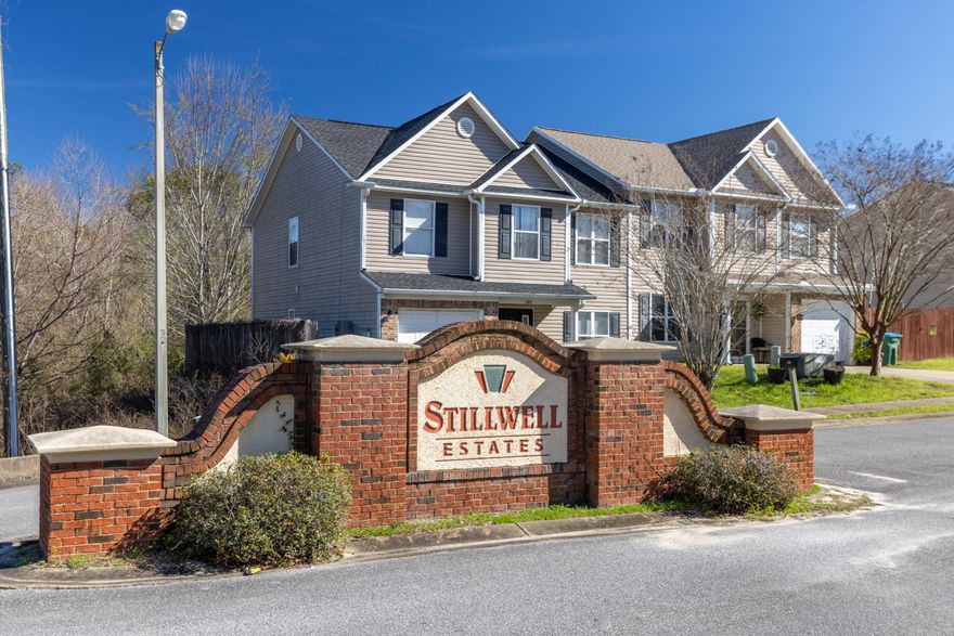 Spiderman says to make this cozy and updated duplex townhouse yours, whether it is a primary residence or an investment property.  This is one of the larger homes in Stillwell Estates with 5 bedrooms and 3 full baths.  There's one master bedroom on each level.  This home features carpet and lvp flooring.The backyard is great for entertaining, grilling, games, horseshoe, and more.The flex room downstairs can be used as a playroom, office, media room or turned back into a bedroom.