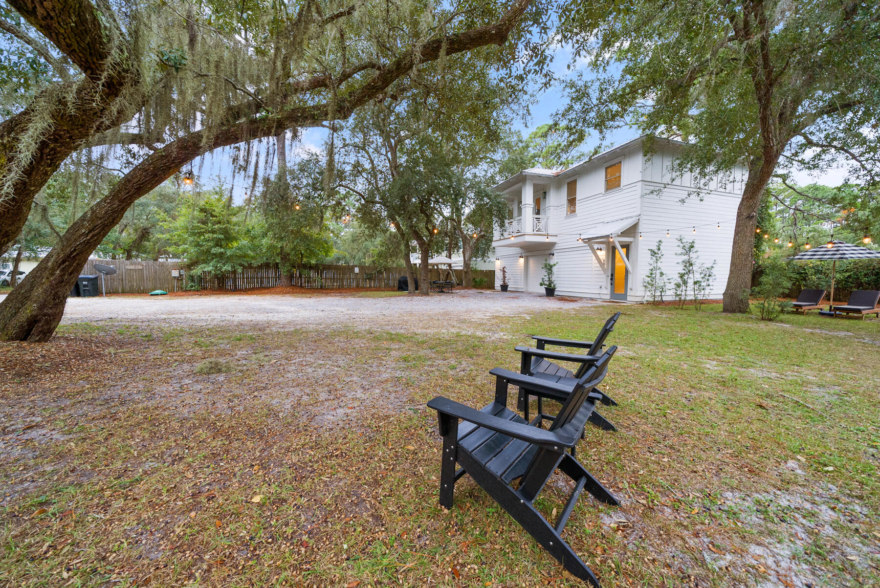 Nestled beneath majestic oaks in historic Grayton Beach, this property reflects the beauty of old NW Florida. The oversized lot boasts a furnished 2/1 residence, plus 3 car garage. Currently income producing Directly across the street to the east, sits Western lake. Offering tranquility and privacy within the fenced perimeter, the parcel sits only 1/4 mile north of the emerald waters of the Gulf of Mexico. Fine dining, shopping, fishing, kayaking, boating, biking and beaching are some of the pleasures available at Grayton Beach. The slow paced surrounding atmosphere is celebrated by residents and visitors alike in this quaint coastal community. NO HOA! The existing 3 car garage can easily be transformed into a significant extra H&C space, to include a large living area, two bathr Offering tranquility and privacy within the fenced perimeter, the parcel sits only 1/4 mile from the emerald waters of the Gulf of Mexico! Fine dining, shopping, fishing, kayaking, boating, biking and beaching are some of the pleasures available at Grayton Beach. The slow paced surrounding atmosphere is celebrated by residents and visitors alike in this quaint coastal community. NO HOA! GRAYTON is the most unique neighborhood on the 30A corridor. You can find out more about this historical area by visiting this link:
https://graytonbeach.com/grayton-beach-history/
The existing 3 car garage can be easily transformed into a significant extra H&C space, to include a large living area, two bathrooms and 2 bedrooms. Quote is available upon request. SO MUCH MORE EXCITING POTENTIAL!!