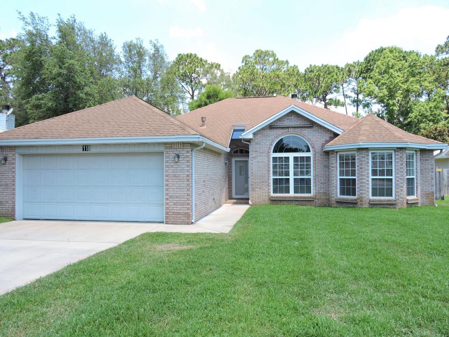 Well maintained home in the highly sought after Bluewater Bay area. Location is excellent as it is only a short commute to the bases and the sugar white sandy beaches of Destin. Home is bright and airy with smooth (no popcorn) ceilings and a split bedroom plan. Family room has lots of room, a fireplace, and a tray ceiling. Dining room has a large window and vaulted ceiling! Master suite is large and has a nice walk in closet. Two bedrooms on the opposite side of the home share a bathroom. There is also a finished Florida room and a conditioned room off the garage, perfect for an office.Wonderful all brick home with a 2004 hip roof - better for insurance. No HOA Fees/No HOA hassles! Roof 2004, HVAC 2012, Gas heat. 2009 Gas water heater, 2002 Vinyl Windows. Flood Zone X.