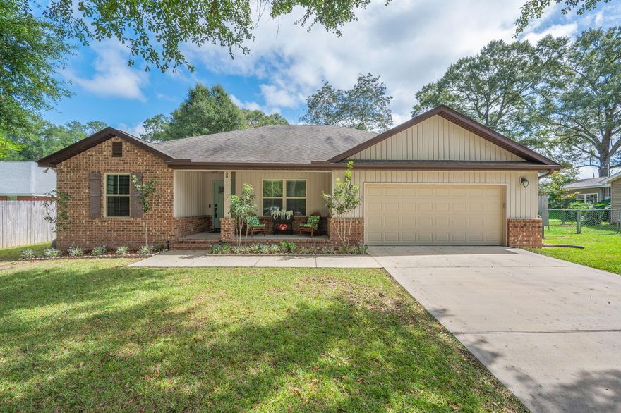 Beautifully maintained custom home showcasing quality craftsmanship and thoughtful design. Features include granite countertops, custom cabinetry, stainless appliances, trey ceilings, and energy-efficient Low-E windows. The open split floor plan offers spacious rooms, wide hallways, and abundant natural light. The primary suite provides a large walk-in closet, dual vanities, and a separate tub and shower. The fully fenced, level backyard is ideal for gatherings, gardening, or a future pool, complete with irrigation system. Located within minutes of local schools, shopping, and main commuting routes. Seller MAY consider VA assumable mortgage available at 3.25% fixed rate--ask for details!
