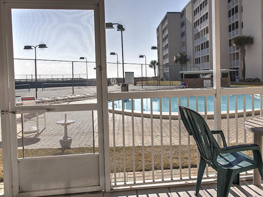 Enjoy the convenience of this ground floor unit located in one of Destin's landmark resorts on pristine Holiday Isle! Located in the heart of Destin, but away from the hustle and bustle of Hwy 98, this one bedroom, one bathroom unit is just steps from the beach and community pool offers tile in the main living area and carpet in the bedroom. All furnishings covey and unit is turnkey for rental. Park right outside of your unit and avoid having to carry luggage and groceries up the elevator! Enjoy the on-site fitness center, laundry facilities, meeting space, heated pool, sauna, shuffle board, and BBQ grills all located within this private, gated community. Building is to be freshly painted this winter. Don't miss out on this excellent property!