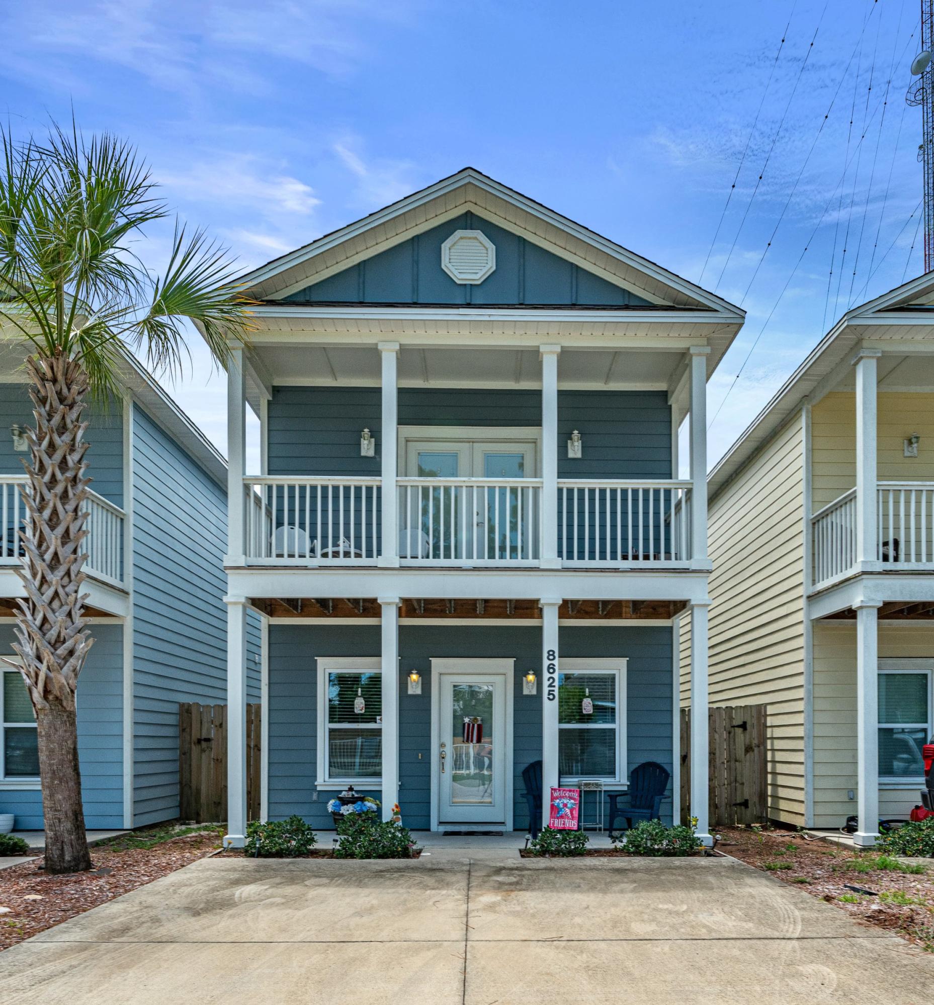 HOME SWEET BEACH! Investors and Families welcome. This beautiful, TURNKEY, FURNISHED beach home has 3 bedrooms, 2 full bathrooms and a half bath. It is located DIRECTLY ACROSS from the community POOL. The master bedroom is on the main floor and has a walk-out to the back patio. All stainless steel appliances and washer/dryer convey. Shaker style wood cabinets and CARRERA MARBLE counters with ISLAND. HOA fees cover pool maintenance, garbage, lawn care and the security gate. This home is a quick ride to Public Beach Access 21 and 34.