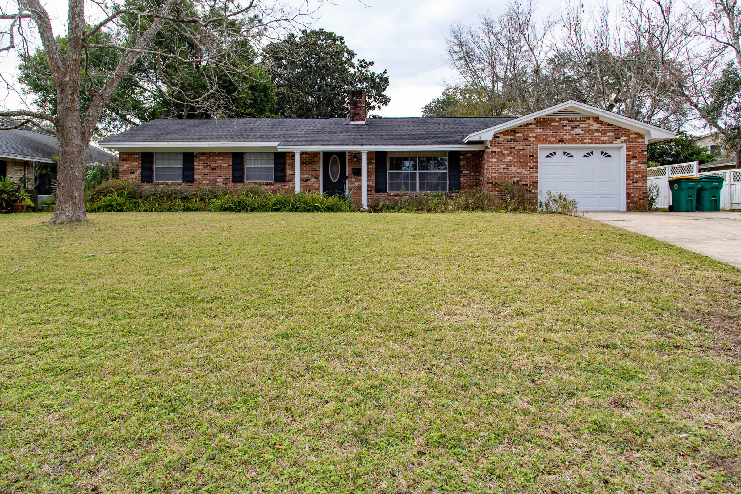 LARGER THAN IT LOOKS!Wonderful, extremely spacious home located in a well established neighborhood in FWB. Home has had only 1 owner and has been well maintained. Sturdy all brick home. Plenty of space for everyone in the family room. Family room and formal living room have wood burning fireplaces--yes 2 fireplaces! 2 master bedrooms and both master closets are lined in cedar. Roof was replaced 2009. No aluminum wire per the electrician. Brand new carpet in the additional bedrooms. Home comes with generator (conveys as is) and a large garage.Backyard has mature trees, HUGE back patio, and a shed (conveys as is). You will fall in love with this one!