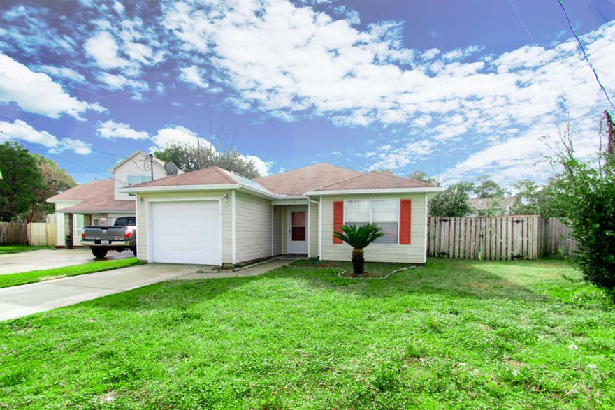 Motivated seller! New roof to be installed prior to closing. This adorable, well maintained property is located in a quiet and private neighborhood. New tile flooring in the kitchen, dining, and common areas. The open floorplan easily allows you to entertain while your guests relax in the living room or hang out on the back patio (a new sliding glass door has recently been installed.) In addition to the separate dining area, this home also features a spacious breakfast bar. The split bedroom floorplan allows for privacy, with the 2 guest bedrooms and bathroom located on the back portion of the home. The large backyard is completely (privacy) fenced in and comes equipped with a yard building for additional storage. Move in ready with vinyl siding for low maintenance.