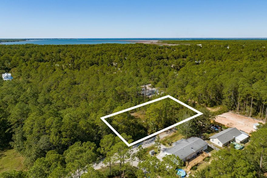 Comprised of five contiguous lots (8 through 12), this 0.72-acre parcel in the Town of Santa Rosa is the ideal spot to construct up to five spec homes for resale, or build your dream primary residence. Its ideal location in this growing area of Santa Rosa Beach offers convenient access to shopping and dining along Scenic Highway 30A, Baytowne, and Grande Blvd, as well as a county boat launch and playground just a mile away at Cessna Landing for a fun-filled day on the Choctawhatchee Bay.