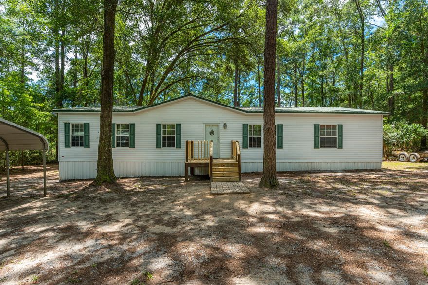 This 3 bedroom, 2 bathroom oversized home sits on over 6 private acres. The large back deck overlooks farm land where you can watch the deer feed from your kitchen window. The front and back deck were recently replaced. Inside, the home has a split floor plan with two bedrooms on one side of the home with oversized closets and a very spacious guest bathroom. On the other side of the home is the very spacious master bedroom which has its own den that could be the perfect office. The master bedroom has a walk in closet while the master bathroom has an even larger closet allowing for plenty of space. The master bathroom also has a separate shower and tub and double vanity. All furnishings will remain in the home. Also included is the shed and inside, the pressure washer, mower and generator.
