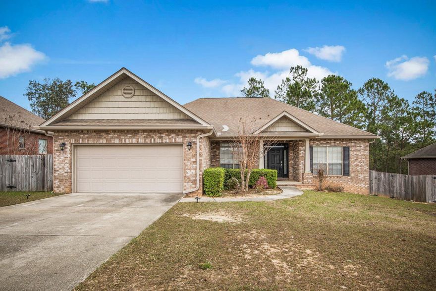 Popular Rolling Ridge neighborhood and south of I-10. Highly desirable elementary school and top rated school system. Open floor plan with split bedroom design. Nice high ceilings, lots of natural light and back yard has a nice deck with a treelined backyard. Lots of features in this home with quick access to military bases. Call today to schedule your appointment.