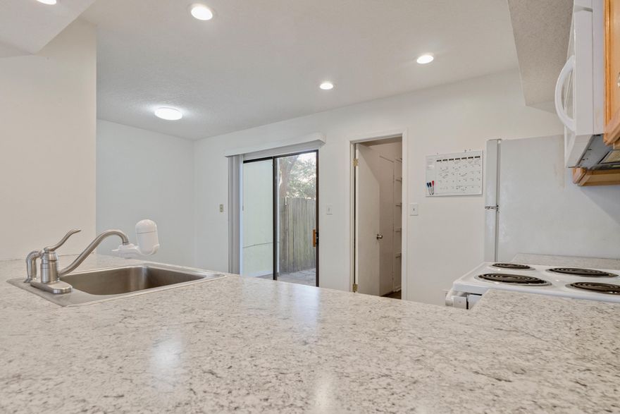 Under $150k and No HOA! This cute 2 bedroom - 1 1/2 bath townhome is conveniently located just minutes from BOTH military bases and the beaches. This home boasts new luxury vinyl plank floors, a very large downstairs, an open kitchen/living area and an indoor laundry room! No popcorn ceilings will be found here! The master bedroom has an oversized walk in closet fit for a queen. The fenced-in backyard is perfect for grilling, gardening and summer time games. A great 1st home or an investment property. Don't wait!