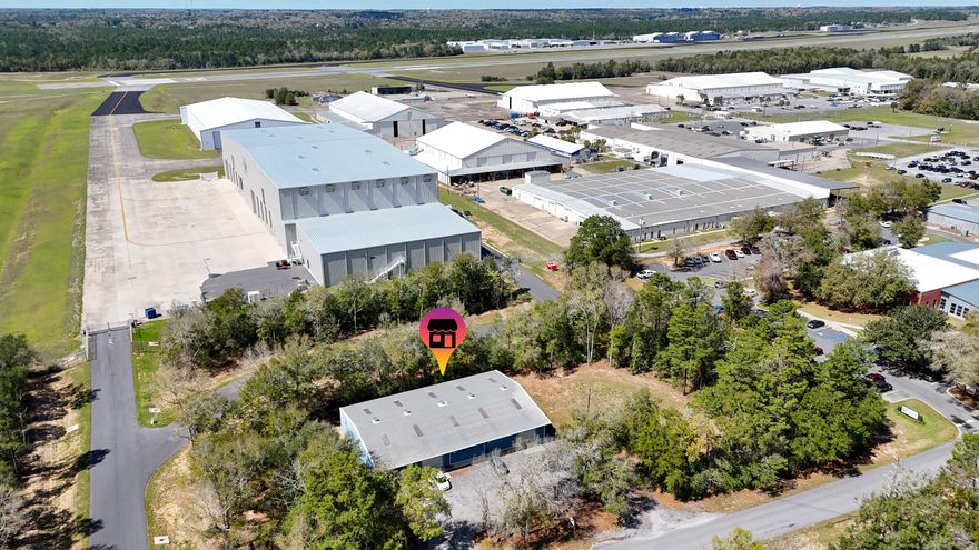 Unlock the potential of this 6600 square foot commercial warehouse on almost 1 acre.  Rare opportunity with endless possibilities.  Currently being used as a retail shop and manufacturing commercial space, the building includes several offices both upstairs and downstairs, expansive open work areas, and two oversized garage doors bays.  This is perfect for large equipment, vehicles or high-volume workflow.  Positioned close to Downtown Crestview this property has visibility and accessibility.  This building has 2 finished bathrooms and 2 HVAC systems for the warehouse and 1 for upstairs offices.