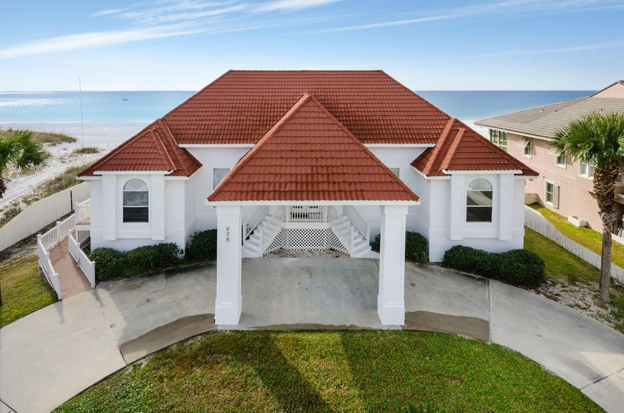 Listing is under a contingency contract. 100' of Gulf Frontage and $250K in rental income already on the books for 2015.Open and airy beachfront villa newly renovated in a crisp, clean and elegant coastal chic aesthetic maximizes views of emerald waters. A private beach walkover leads to 100ft of deeded beach. With distinctive design elements like, vinyl plank flooring, a barrel-tile roof, and semicircular driveway, this home is exceptionally designed. Sparkling waters greet you upon entering the home, and water views flow effortlessly throughout the interior. On the ground floor, the wide expanse of windows in the open kitchen/dining/living area welcome panoramas of emerald waters, while the open concept floor plan mimics the breezy feel of the surrounding scene.