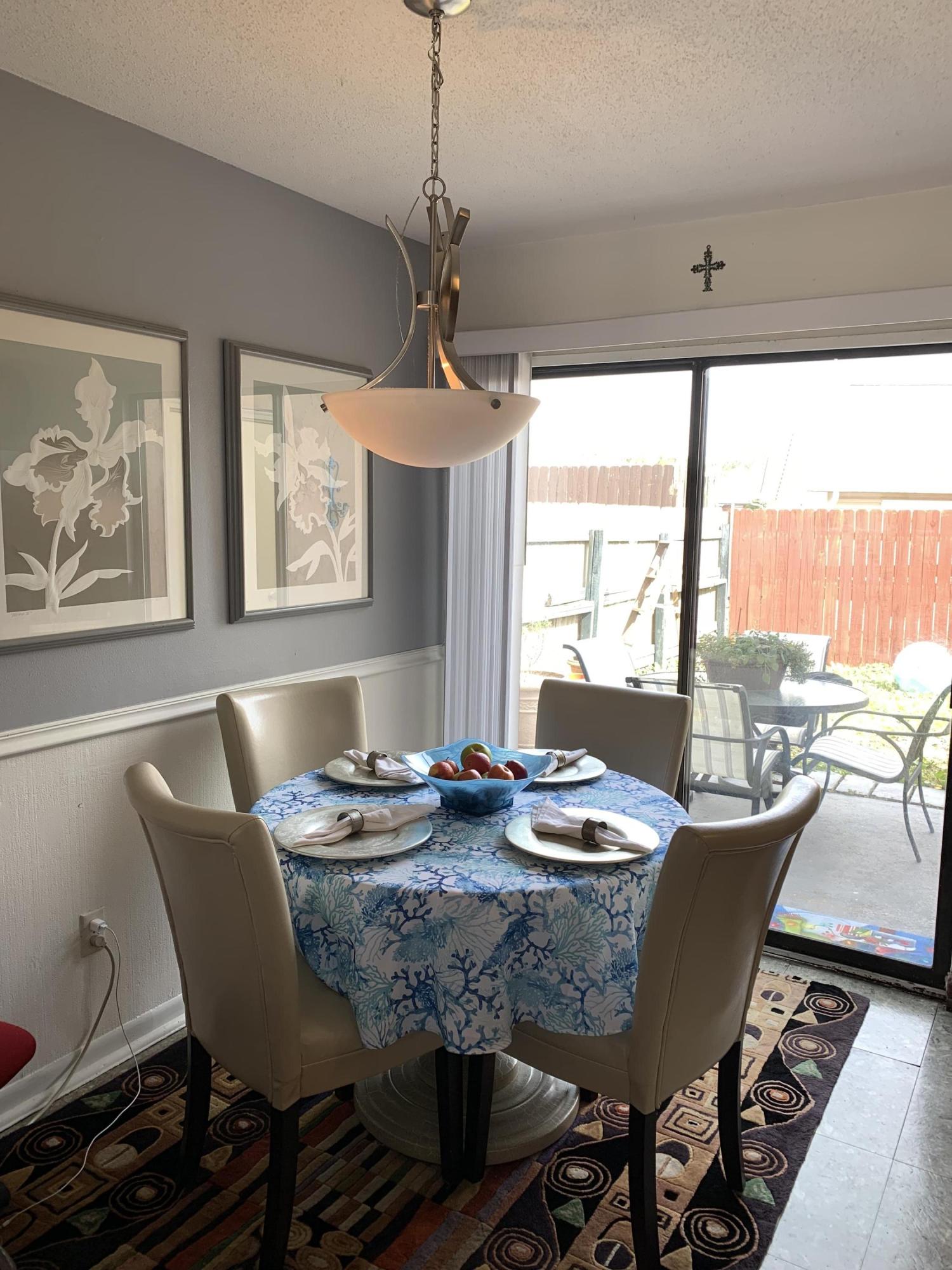 Investment opportunity in the heart of Destin. This end unit features 2 bedrooms, 1-1/2 bathrooms, living room, dining room, kitchen, laundry and privacy fenced backyard.