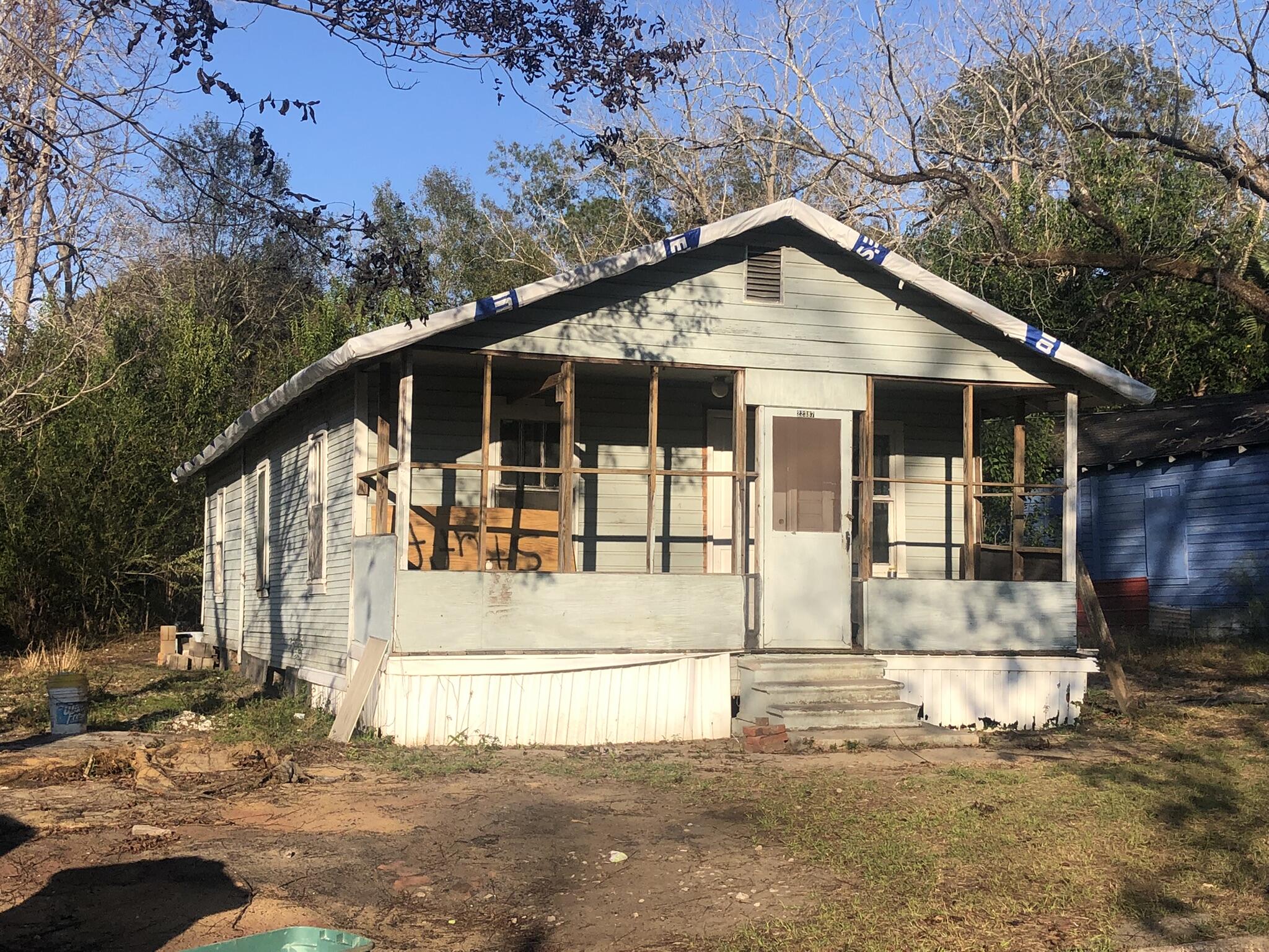 ***BOM through no fault of the sellers. Buyer's home sale not completed.*** If you saw this one before, you'll see how far it's come in just a short time. The current owners have poured so much into this fixer upper, and it's still a work in progress, but unfortunately they must sell due to an unrelated matter. Pick up where they're leaving off and this could be a nice rental or flip. Building materials already purchased will remain. Roof surface has been stripped and wrapped for a new one.
