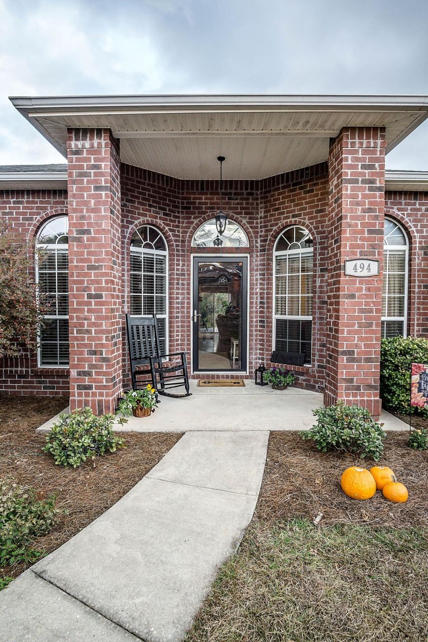 All brick 4 bedroom 2 bath South of I-10. Custom paint in kitchen, breakfast room and both baths. Split floor plan, formal dining room and large living room. Glass sliding doors in living room open up to nice deck overlooking the back yard, as well as plant ledges. Kitchen has plenty of cabinet space with island. Master bath has his & hers walk in closets, with garden tub & separate shower. New Goodman AC unit installed in July 2016. New Wood Floors installed 2013. New Bathroom floors installed August 2016. All blinds convey and gutters.