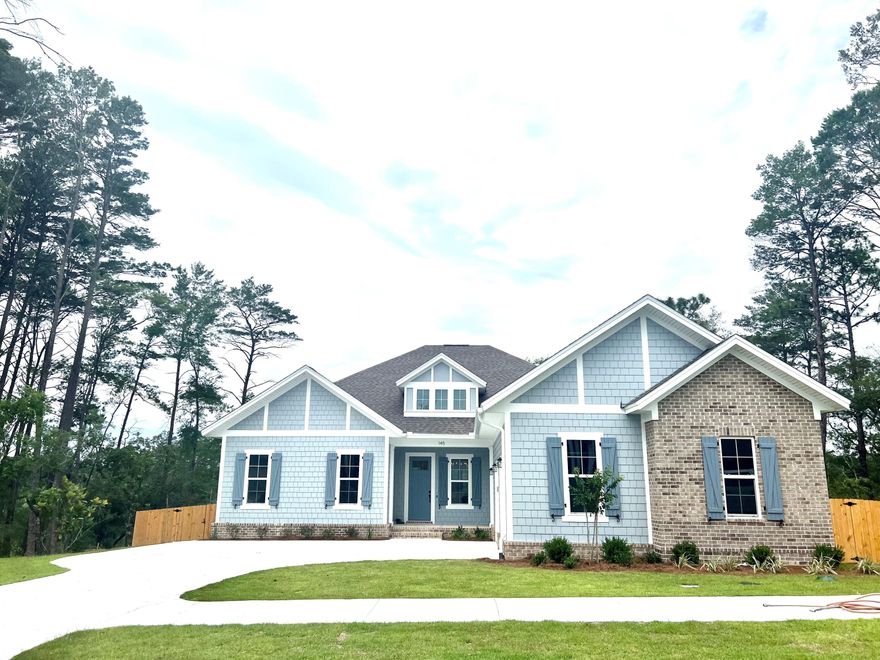 This is a Presale home put into the MLS for COMP Purposes ONLY.  Craftsman style , one story 3 bedroom plus an ofice home, located in the desirable, DEER MOSS CREEK neighborhood of Niceville.  This home is built on the preserve and walking path, with no building directly behind the home.  Spacious, walk out,, deck, w/ stairs to walk to the backyard w/ a 6' privacy fence.  Home has an open floor plan, with engineered hard wood through out the main living areas. Stairs to an unfinished bonus room that can be finishes out at a later time. Tile in the wet rooms.  Custom, all wood, soft close cabinets.