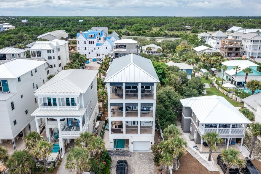 Welcome to your dream coastal retreat at 64 Emerald Cove Lane S in the highly sought-after Inlet Beach! This expansive 6-bedroom, 6-bathroom home offers luxurious living with breathtaking Gulf views from multiple levels. Perfectly designed for both relaxation and entertaining, this four-story masterpiece is packed with premium features that will captivate you from the moment you step inside.  Enjoy private beach access, a private pool, 6 spacious bedrooms each thoughtfully designed and decorated with ample space and natural lighting, 6 luxurious bathrooms with high-end finishes and spacious outdoor areas perfect for living and entertaining.  Rare opportunity to have beach owned by the HOA, so you can enjoy privacy and uncrowded beach time. Located just moments from the gulf, and a prime location in one of Floridas most desirable beach communities.  Bike to Rosemary Beach, Alys Beach and the Shops at 30 Avenue. This home boasts one of the tallest lookouts in Inlet Beach.  This is a perfect home for entertaining, sunsets, and family fun. Beautifully decorated, with an elevator, wine fridge, iced makers, grill, fireplace, custom bathrooms, incredible master suite, walk in closets, and so much more.  Don't miss the opportunity to make this your beach home or personal rental machine and own your piece of paradise.
