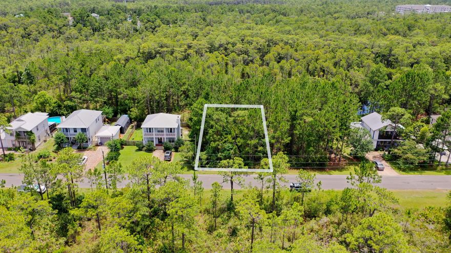 Nice building lot in popular area close by Sacred Heart Hospital, shopping in Grand Boulevard, Topsail Hill State Park and 8 minutes to beach access across from Stinkys. 6 minutes from 30A
