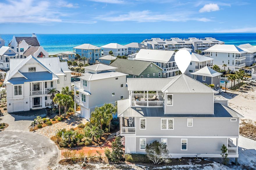 Endless Summer - A Luxurious Coastal RetreatWelcome to 'Endless Summer,' a stunning luxury property perfectly situated in the coveted Dunes Estates of Seagrove, just steps away from the pristine shores of Eastern Lake on 30A. This exquisite 5-bedroom, 4.5-bath residence is not just a dream home; it's a proven rental investment with a remarkable track record, making it an ideal opportunity for savvy investors seeking a slice of paradise.As you enter this elegantly designed coastal retreat, you are greeted by elevated finishes and an inviting atmosphere that seamlessly blends comfort with sophistication. The spacious open floor plan showcases beautiful hardwood floors and stylish coastal accents, creating a warm and welcoming environment for family gatherings and entertaining guests.

The main living area features expansive windows that bathe the space in natural light and offer breathtaking views of the lush golf course and the glistening Gulf beyond. With bedrooms thoughtfully distributed across each level, everyone can enjoy their own private oasis, while six balconies provide ample opportunity to soak in the stunning vistas and gentle sea breezes.

Step outside to discover your personal paradise. The backyard is a true entertainer's dream, featuring a sparkling heated pool surrounded by a spacious lounging deck, an outdoor shower for post-beach convenience, and a cozy fire pit that sets the perfect ambience for evening gatherings under the stars. Take a moment to enjoy a quick game of tennis or Pickleball in the community courts. After a refreshing dip, take a leisurely stroll down to the nearby beach access and immerse yourself in the tranquil emerald watersyour own slice of coastal bliss.

With its prime location, luxurious amenities, and proven rental history, "Endless Summer" offers not just a home, but a lifestyle defined by sun-soaked days and tranquil evenings. Experience the unparalleled charm of 30A and make this luxurious property your ownwhere every day feels like a vacation. Don't miss out on this exceptional investment opportunity!