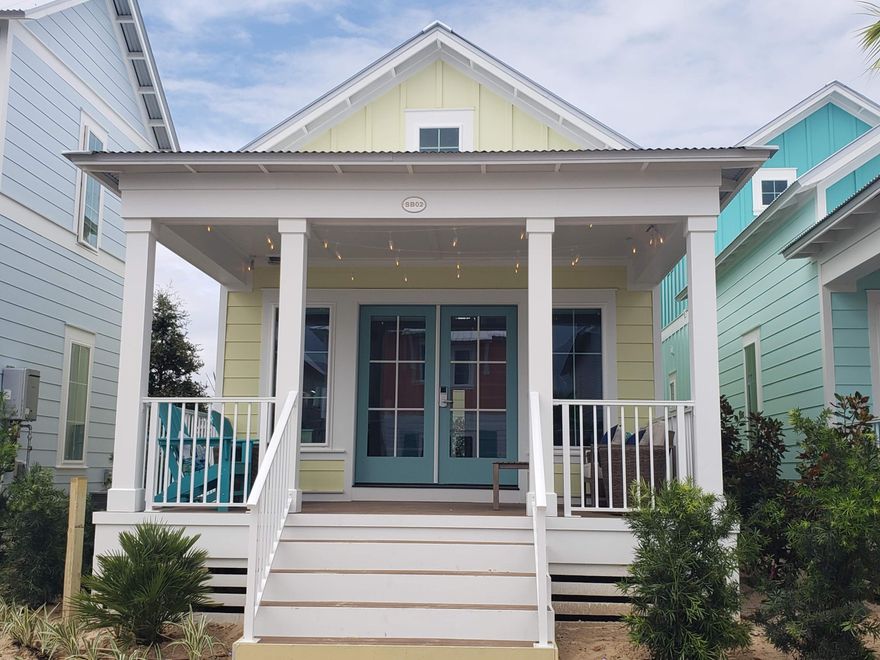 Be among the first to discover this thoughtfully curated and efficiently designed home in a charming ''surf village'' at Margaritaville Beach Cottage Resort in Panama City Beach. The Longboard plan lets you connect and gather on your front porch or step inside to explore 760 sf of heated/cooled space perfectly designed to fit your every need. These charming tiny homes feature a bedroom with a king bed and bath on the first floor and a sleeping loft with built-in full over full bunk beds on the 2nd level.