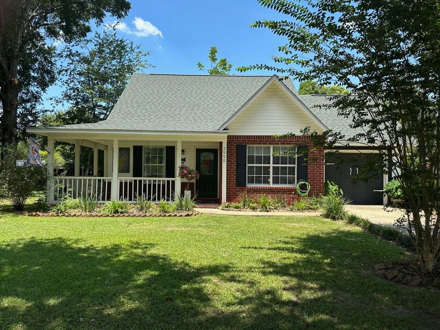 Charming Country Style Home with on a Spacious Corner Lot in Pace's Floridatown - Just a Short Distance from the Bay!Welcome to this beautifully maintained country style home, set on a generous 1/2-acre corner lot in Pace's desirable Floridatown subdivision--just a short distance from Escambia Bay. Built in 2000, it features a classic brick front and inviting wraparound front and side porches, perfect for enjoying peaceful mornings or relaxing evenings.Inside, you'll find bamboo flooring in the living room and bedrooms, custom tile throughout, and thoughtful artistic touches. Recent upgrades include a 2024 HVAC, 2020 roof, and a newer hot water heater. Survey, and Wind Mit available. The open great room flows into a well-designed kitchen with tiled countertops, breakfast bar, pantry, and full appliance package. A sunlit dining area looks out to the beautifully landscaped yard.
The primary suite features a tiled private bath, a separate dressing area, and French doors that open onto a large covered deck, creating an effortless indoor-outdoor living experience.
The partially fenced backyard is a true garden oasis with fruit trees, vibrant plantings, and a "secret garden"ideal for relaxing, entertaining, or simply enjoying the natural beauty.
This one-of-a-kind home combines farmhouse charm, modern comforts, and a peaceful coastal lifestyle just moments from the bay. Don't miss this beauty that offers both close location to shopping, restaurants and entertainment, and a generous and private lot to retreat and enjoy--it won't last long.

