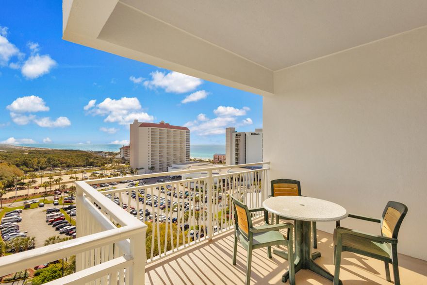 Updated cabinets and NEW Wood-Like flooring throughout. Experience breathtaking beach-to-bay vistas from this 9th-floor, northeast corner condo in Luau II. Featuring a wrap-around covered balcony, this unit offers stunning panoramic views. With a versatile lock-off floor plan, it can function as a studio, a 1-bedroom, or a spacious 2-bedroom condo, providing flexible living and rental options. Conveniently located across the street from the Sandestin beach access and beachfront restaurant. Luau offers an oasis getaway with a seasonally heated pool, relaxing waterfall, hot tub, grilling area and fitness center. In addition, owners can take advantage of the sundeck on the top floor with panoramic views from the gulf to the bay. As an introduction to the Sandestin lifestyle, we invite our new owners to explore amenities that make Sandestin special. The listing brokerage and seller(s) are presenting the buyer(s) of this property with (2) 90-minute rounds of Tennis court time, a golf foursome at one of our three championship courses, and a round of golf for up to four (4) players at the unrivaled Burnt Pine Golf Club.
Sandestin Golf and Beach Resort features more than seven miles of beaches and pristine bay front, four championship golf courses, 15 world-class tennis courts, a 226-slip marina, a fitness center, spa and celebrity chef dining. Shop, dine and play at the charming pedestrian village, The Village of Baytowne Wharf and more. Inside the gates of the resort, residents enjoy a balanced lifestyle of high-class living, spanning the 2,400 acres from the beach to the bay. Everything within the gates of the resort is accessible by golf cart or bicycle. The entire resort is interconnected by miles of pedestrian, bike and golf cart paths that weave through groves of live oaks, meandering past natural lagoons, fountains, man-made lakes, and meticulously landscaped fairways.