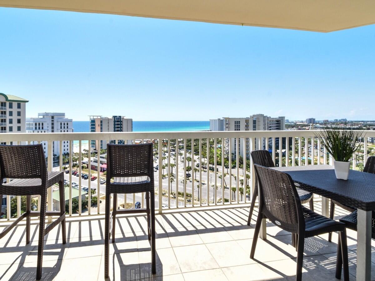 Welcome to this fabulous, fully remodeled unit located just below the Penthouse, offering panoramic views that stretch for miles. Stylish, spacious, and impeccably maintained, this condo shows pride of ownership in every detail. The interior features fashionable and durable wood-look tile flooring, perfect for beach living, along with charming shiplap accent walls and custom barn doors that add coastal character and warmth. The color palette is fresh and inviting, creating a relaxing retreat you'll never want to leave.Comfortably sleeping up to 8 guests, this property is not only an ideal personal getaway but also offers excellent rental income potential. Make this your dream destination, or your next investment opportunity! St. Lucia is a short-term rental building nestled within the prestigious 31-acre gated community of Silver Shells Beach Resort & Spa. The condos are bordered by the pristine Henderson Beach State Park to the east. St. Lucia amenities include a lovely lobby, private pool and hot tub, outdoor grill area, climate-controlled storage, and garage parking. Silver Shells is a 27+ acre guarded & gated resort with over 1000 ft. of beach frontage. Amenities include: the lagoon pool with kiddie pool and hot tub, indoor/outdoor heated pool, separate cardio & weight rooms, 2 tennis courts, 6 pickle ball courts, basketball court, children's playground, Silver Shells Day Spa and Ruth's Chris Steakhouse.