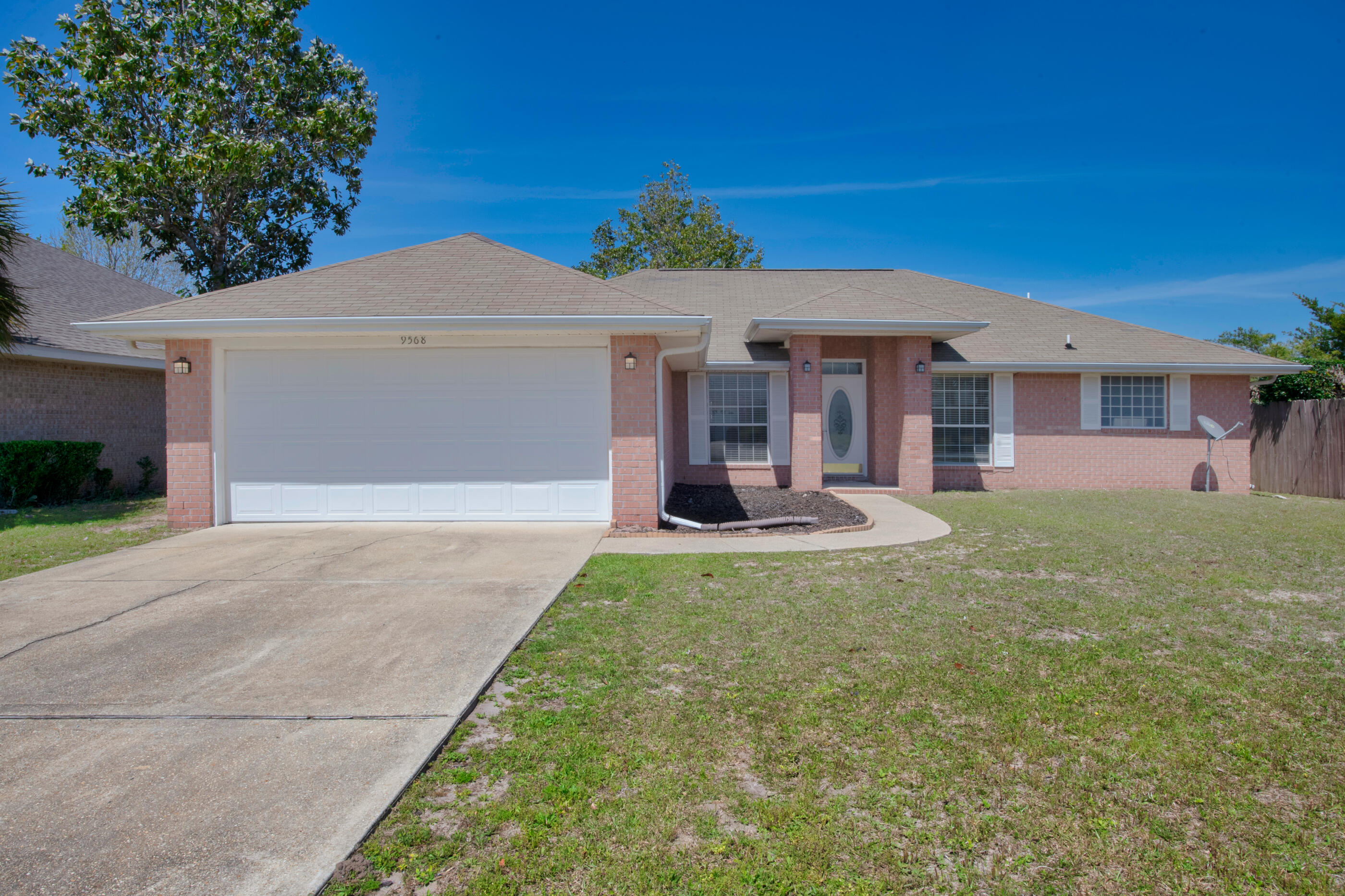 Showings start Saturday 4/9 - Carpet cleaning 4/8. Welcome to this adorable turnkey brick home! Such a perfect location just far enough from 98 to lose the traffic noise, but easy access via a light. No HOA! East end of Navarre makes your commute easy! This fabulous neighborhood home has fresh paint and flooring. The ever-popular split floorplan lines up the large en-suite master behind the great room, and two spacious bedrooms reside behind the kitchen area. Very roomy closet space! Dining room AND a Den, cozy breakfast area and kitchen pantry, and fenced back yard. Great flexible spaces. Freshly painted. Bedrooms and great room carpeted, new vinyl plank in wet areas. Roof 2003, HVAC 2019, Water Heater 2019, dishwasher and microwave 2021. Seller will add new roof with a great offe