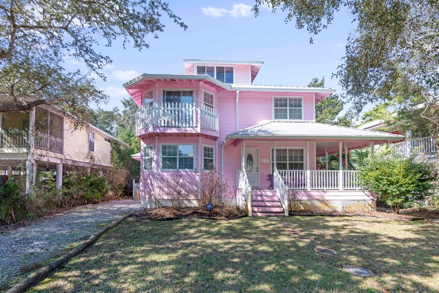 A quaint Victorian beach cottage in the heart of Seagrove, 27 Dalton is ideally located just a few blocks from the Eastern Lake Regional Beach Access. The sunny ground floor living area leads to a screened back porch that has been lovingly used for many years.  The primary suite on the second floor has an en-suite bath and dressing area, and two other bedrooms on the second floor share a hallway bath.  The third floor tower offers 270-degree views of the treetops of Seagrove.  A fenced back yard with heirloom azalea and camelia bushes is kept lush by an in-ground sprinkler system.