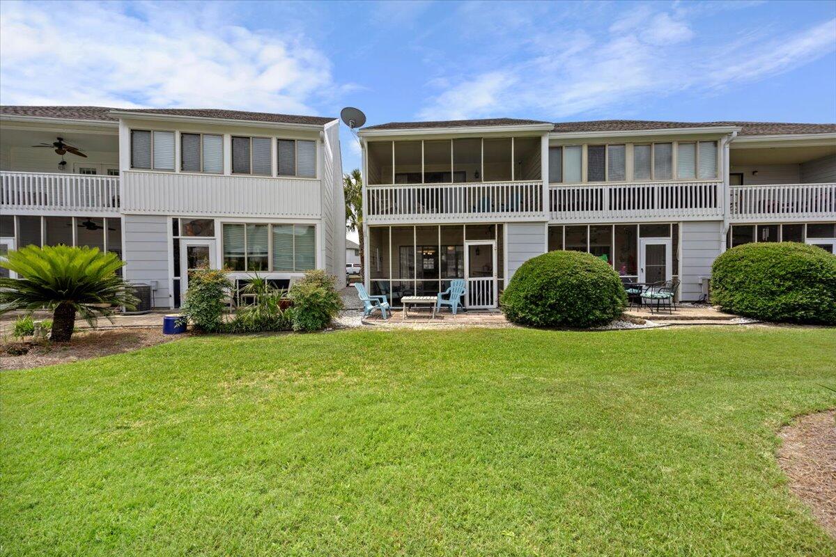 Turnkey townhome just a short 3/10ths of a mile from the sugar sand beaches and Pompano Joe's Restaurant. End Unit!! Amazing location Community pool and clubhouse in center of courtyard. Unit comes with 2 assigned parking spaces, directly in front of unit. On a vacation rental program and being sold fully furnished. Start earning income on day one of your new piece of paradise!