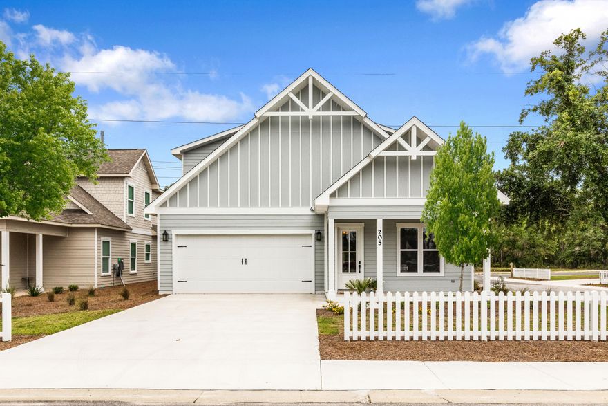 CORNER LOT and One of the largest 4 bedroom, 3.5 bath home in Paradise Cove, with 2 car garage and upgrades throughout.The popular SUMMERSIDE floor plan is the only one that includes a study!The first floor master suite features an oversized master bath with dual vanities, garden tub, walk-in shower and his and her walk-in closets with built in shelving. The large kitchen features stainless steel appliances, breakfast bar, and custom soft-close cabinetry. The open floor plan features 10' ceilings with crown molding, and the living room with fireplace opens to the screened porch. The second floor offers 3 guest bedrooms and 2 full baths. Like new only lived in for less than 3 month with upgrades like hardwood floors on the main level, living room with fireplace.