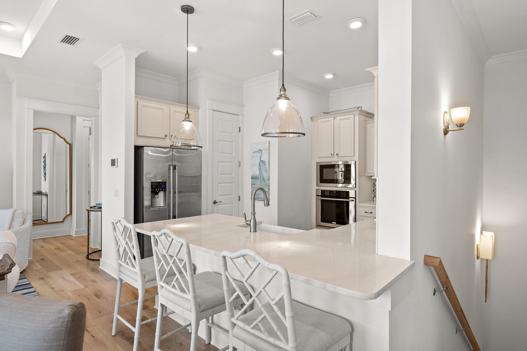 Positioned perfectly on the corner of Milestone Drive, this two-bedroom two-bathroom townhome is located in the highly desirable community of Prominence. Having never been rented, this turn-key and fully furnished townhome is in pristine condition. Featuring a light and airy open concept living and dining space that is ideal for entertaining guests. The fully equipped kitchen includes a large breakfast bar, quartz countertops, farmhouse sink, and gas stovetop. The master bedroom, located on the left side of the unit, is meticulously designed and is complete with beautiful wood floors and a coffered ceiling. The master ensuite offers dual vanities, a large walk-in closet, and a shower. The guest bedroom is complete with an abundance of natural light, wood floors, and direct access to the