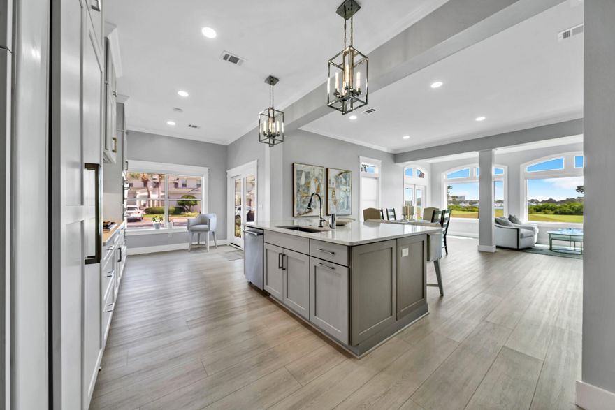 This townhome offers amazing views of the Bay, Golf course and Marina