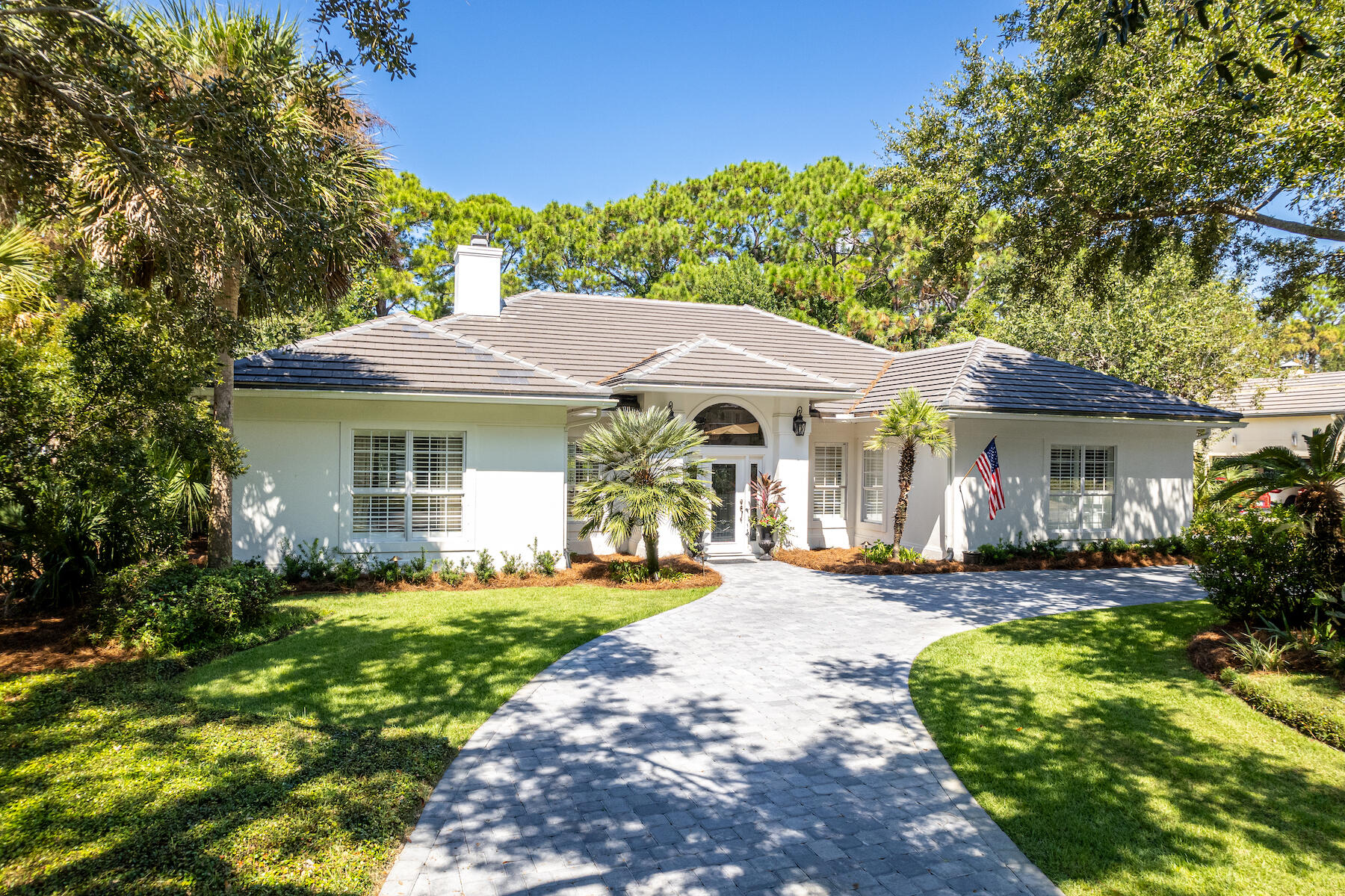 Welcome home to this beautifully updated single story gem nestled along the 17th fairway of The Raven Golf Course.  This residence boasts a brand new roof (2020), tankless gas water heater (2019), hvac (2020), new window shutters (2023), fresh paint inside & out (2020), new pavers front and back (2023), and the pristine pool with new tile and heat pump (2023). As you step through the foyer, you'll be immediately struck by the bright and airy floorplan that bathes every corner. The cozy gas fireplace with built in shelving is the focal point of the living area. The kitchen is a haven for those who love to create culinary delights. Equipped with new 2021 appliances, it's the perfect space to craft your culinary masterpieces.