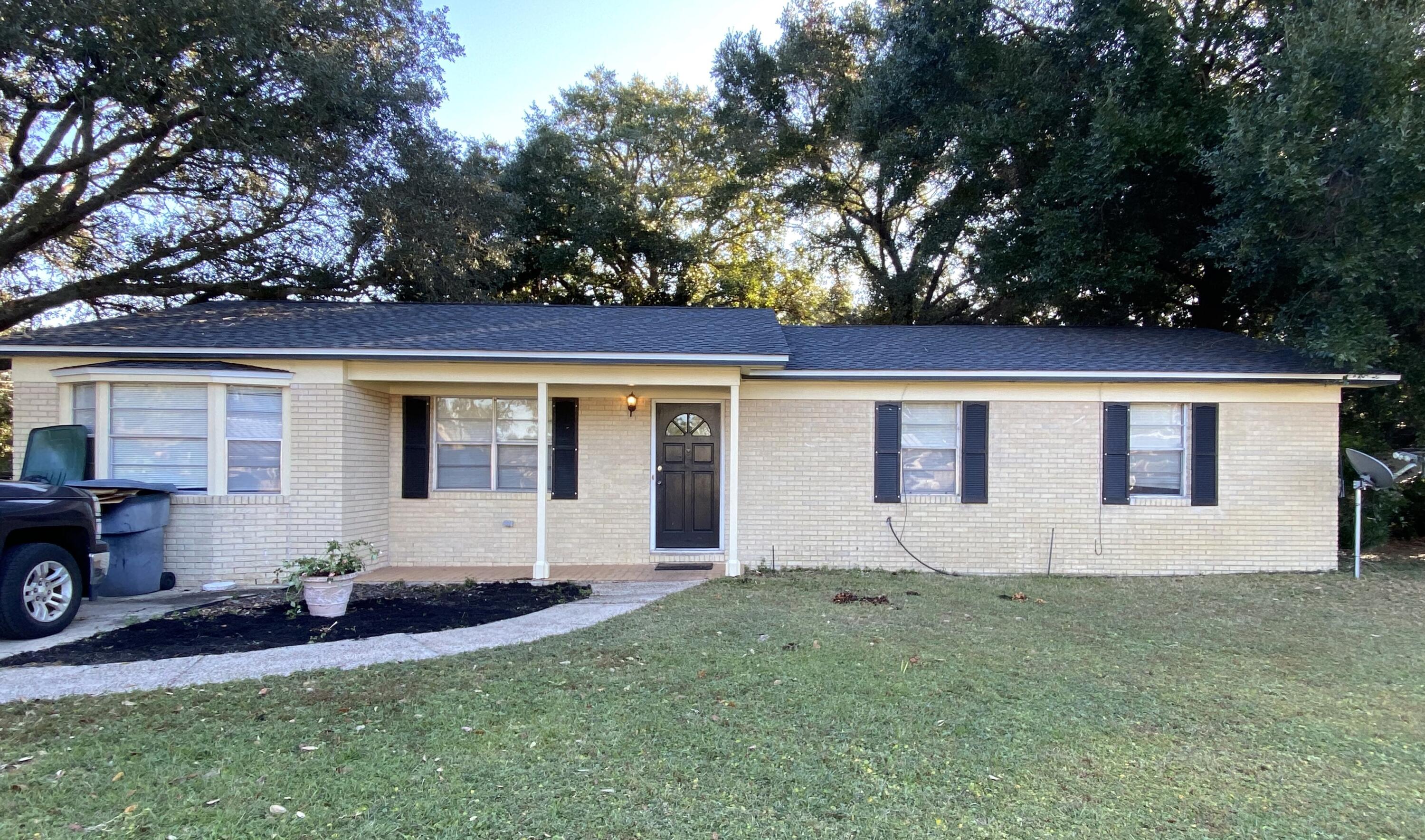 Retro brick home on a large corner lot, new roof, with two living areas. Front living room features bay window. Kitchen stove and refrigerator new 2021, easy access to pantry and laundry room. Step down into the family room with imported Italian tile floors cozy wood burning fireplace. Large window overlooks back yard and beautiful magnolia tree with sliding glass doors to access back patio and fully fenced in yard. Oak Hardwood floors can be found in dining area, entry, hall, bedroom and master bedroom. Things neighboring this home: tennis courts, pickle ball courts, disc golf, Elliott Elementary School, soccer fields, trails and all that Ferry Park has to offer. Buyer to verify all dimensions* Home is being sold ''as is'' sale.