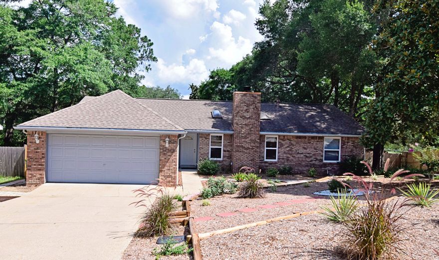 Charming 3 bedroom / 2 bath home with in-ground pool in a great Niceville location; close to schools, shopping, recreation, hospitals, and Eglin AFB. Home boasts a beautifully landscaped and well-kept yard--low maintenance with drought resistant plants. Antique hearth (approx. 140 years old) built into fireplace in the spacious great room with vaulted ceilings and skylights. Generous master bedroom has sliding door leading onto a open deck with pool & water feature for outdoor living and sunset viewing. Each additional bedroom is of comfortable size. This is a lovely home in a great location that's just waiting for you to move in! Call to schedule a showing today! Buyer to verify anything deemed important to buyer including but not limited to sq/ft