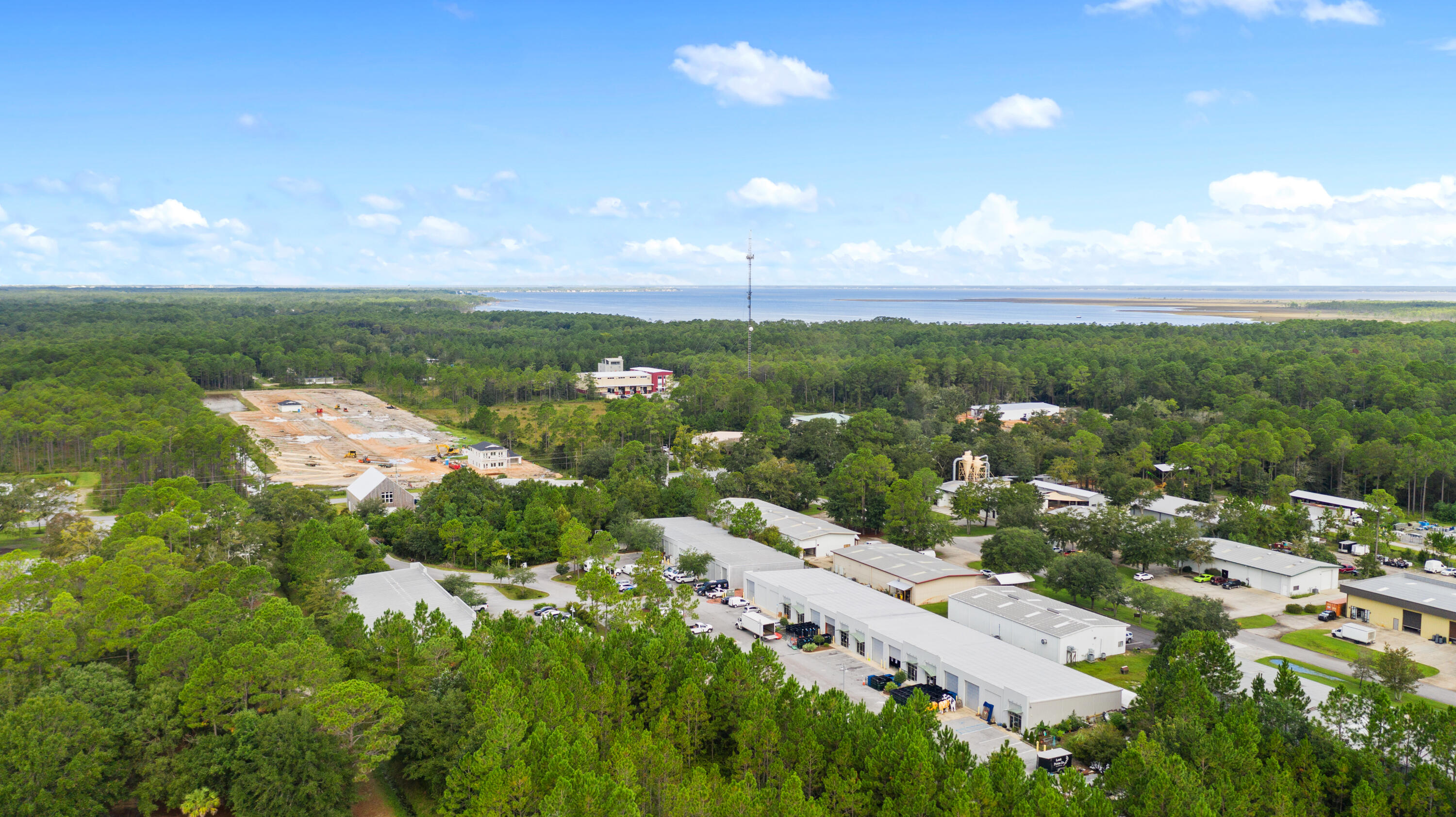 FOR LEASE | 1,850-22,150 SF | Premium Office & Flex Space - Santa Rosa Beach, FLProperty Type: Office / Flex / WarehouseTotal Available SF: 22,150 SFMinimum Divisible: 1,850 SFLease Type: Flexible TermsAvailability Date: November 1, 2025Parking: Ample + 18-wheeler accessZoning: Commercial (multi-use)Property Overview:A truly unique commercial opportunity in the heart of Santa Rosa Beach, FL - this multi-unit property offers over 22,150 SF of highly adaptable space. Whether you're looking for premium office headquarters, flex/industrial functionality, or clean warehouse space, this property offers unmatched versatility with upscale finishes and a prime location.Units:
Unit 1 - 5,750 SF: Modern high-end office w/ 14 private offices, conference rooms, full kitchen, lounge, bar, co-working, and restrooms.
Unit 2 - 2,000 SF: Clean open warehouse.
Unit 3 - 4,000 SF: Office/warehouse combo w/ private office.
Unit 4 - 2,000 SF: Mirror of Unit 3.
Unit 5 - 4,550 SF: Premium office with 11 offices, kitchen, lounge, executive conference room.
Unit 6 - 1,850 SF: Office/warehouse with 3 private offices and large co-working space.
Unit 7 - 1,850 SF: Open warehouse unit.
Location Highlights:
Excellent access to Hwy 331, 30A, Destin, Miramar Beach
Surrounded by thriving commercial and residential development
Great for tech firms, creative agencies, logistics, co-working operators, and more