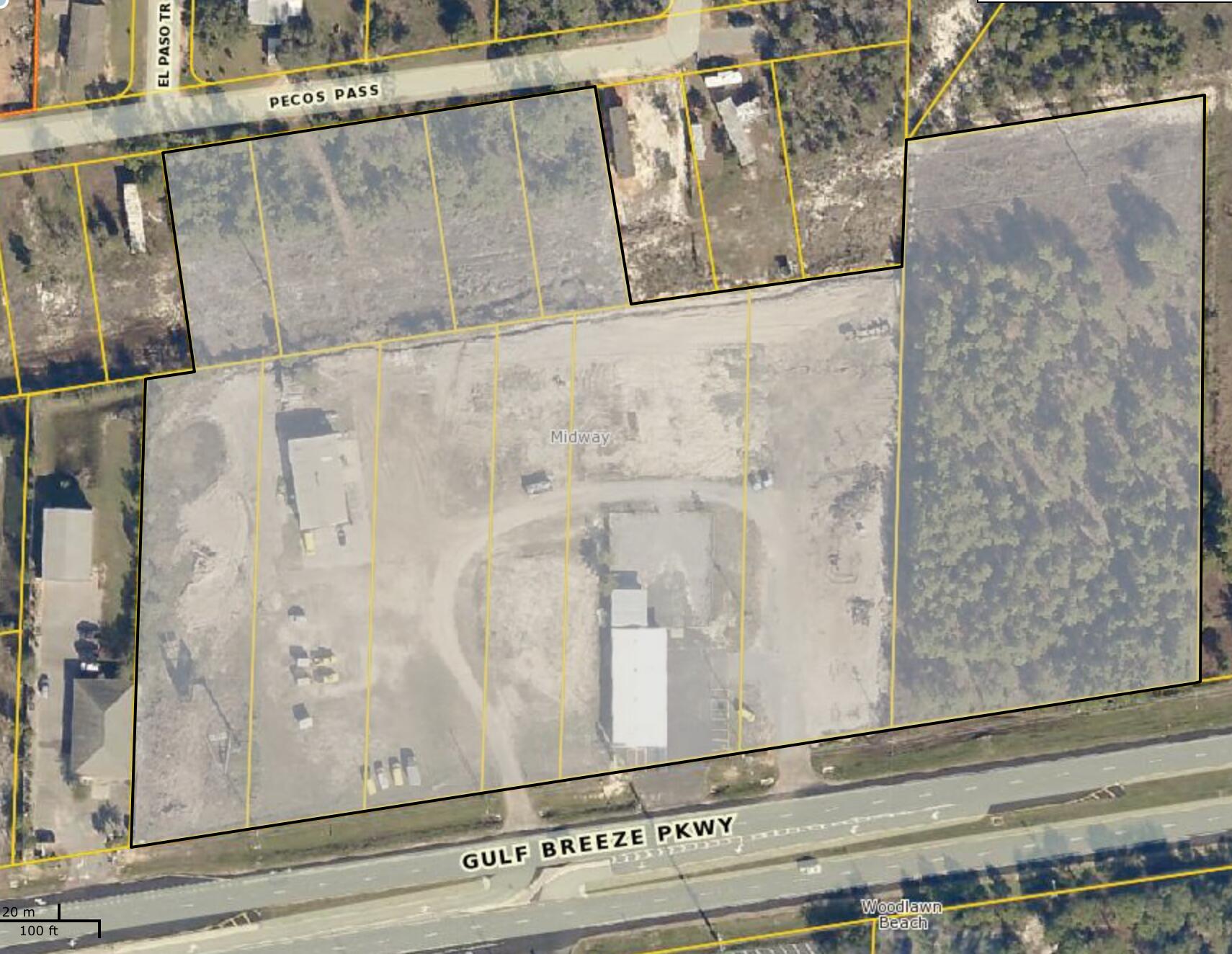 REDUCED! This 10.4 Acre site is zoned Highway Commercial and lies between Gulf Breeze and Navarre Fl. The property has 920 (+/-) front feet on Hwy 98 and traffic counts of 33,000 cars daily. The property has been partially cleared/ led, has several DOT curb cuts, and has full access from east and west bound traffic. There are currently two office/ warehouse buildings with year-to-year tenants, Seller is willing to divide.