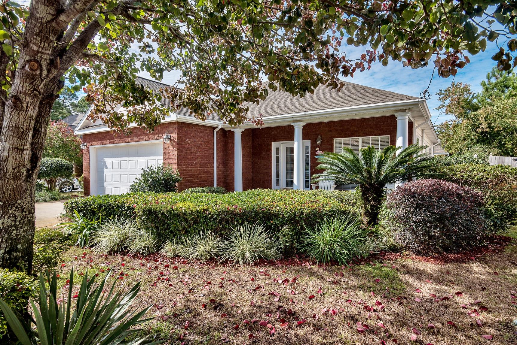 3/2/2 Florida style, Brick home situated on a beautifully landscaped Corner lot. Vinyl trim. Low maintainance. No HOA dues! Close to the beach and shopping and all the fun the Emerald Coast has to offer. Presenting a open living, kitchen and dining room style. All stainless appliances this home has 14' ceilings and coffered ceilings all accented with crown molding to grab your attention. Open large dining leading to Florida room perfect for morning coffee and a extra plus for your confort and pleasure when entertaining. Large master with walk in closet. Complimented with Ceiling accents. Plus with french doors opening to Florida sitting room. Double sinks, separate shower, garden tub. This home is made for making memories. Look no further you have found your pefect place in paradise.