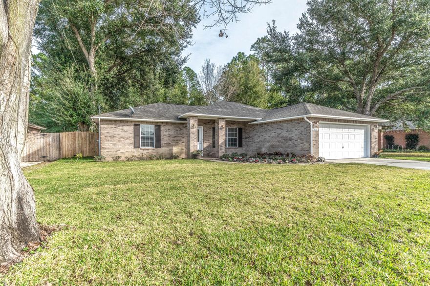 Available now for a new family.  Nicely kept 3 bed 2 bath home in a tucked away neighborhood called Hidden Estates in Navarre.  This 1628 sq ft home has tile flooring throughout much of the living-space with tall vaulted ceilings complimenting the semi-open floorplan.  The back yard has a custom wooden deck properly built around a professionally installed above-ground swimming pool and is kept private by a thick wooded area behind the homes privacy fence. This property is located within short commuting time to Hurlburt Field and Navarre Beach. Consider this house for your next home.