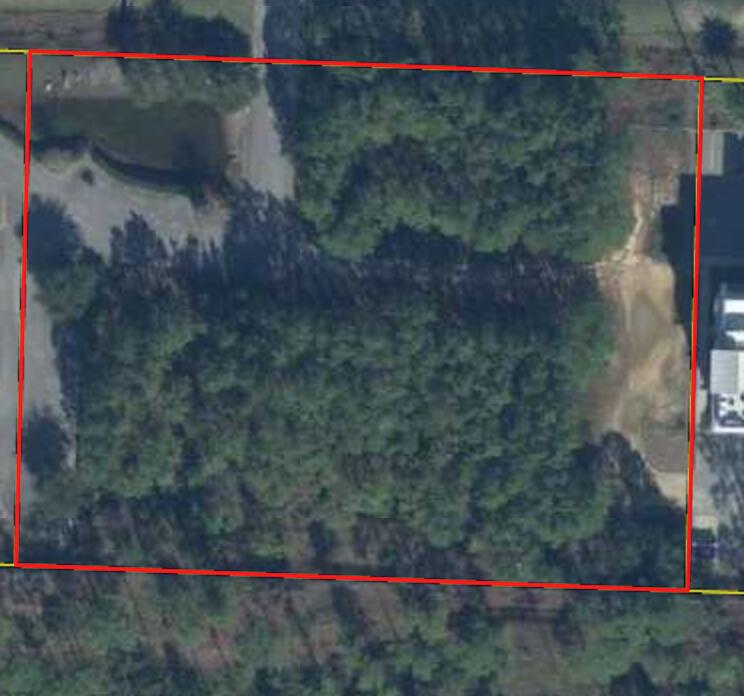 REO-This is an incredible piece of commercial property that sits directly across from the new Walmart in South Walton and backs up to the Topsil State Park. There are a limited number of developable parcels on the South side of Hwy 98 between the Sacred Heart Hospital and the 30A Intersection, and this one is of good size with the access already built. The property shares the access with a medical center. This is a great piece for an additional medical or office center, a small hotel, or a restaurant.
