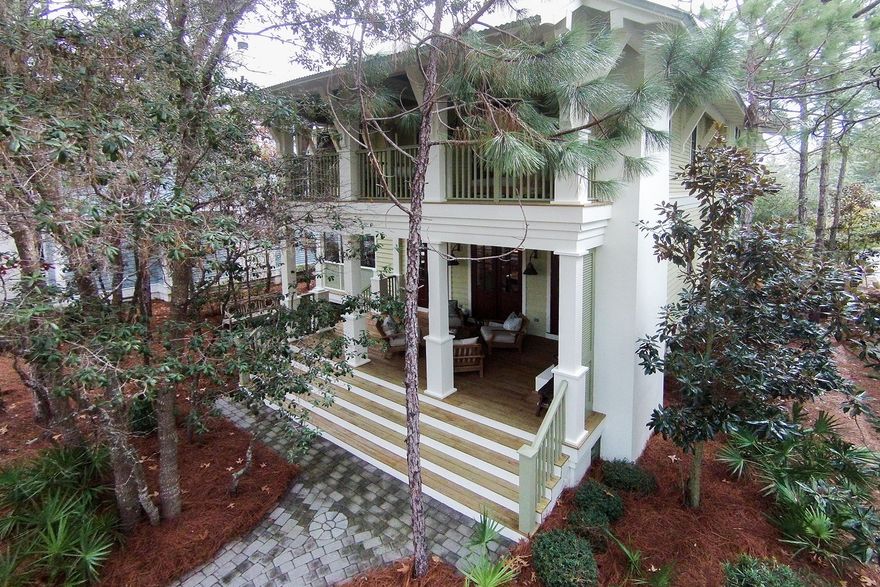 The very best of Watercolor living is all here in this beautifully decorated Camp District home. This spectacular beach cottage has never been on a rental program and has been immaculately maintained. With only the highest quality design, detail, and finish, discover a bright and open floor plan, and stunning features throughout. With multiple outdoor porches, including one screened and another with a fireplace, this home carefully blends the indoors with the outside. The beauty, simplicity and ease of this residence is truly inviting and comfortable for all. It's direct location fronting the beautiful Wood Fern Park is only a short distance to the Camp Watercolor pool, making this a perfect full time, vacation, or rental property.