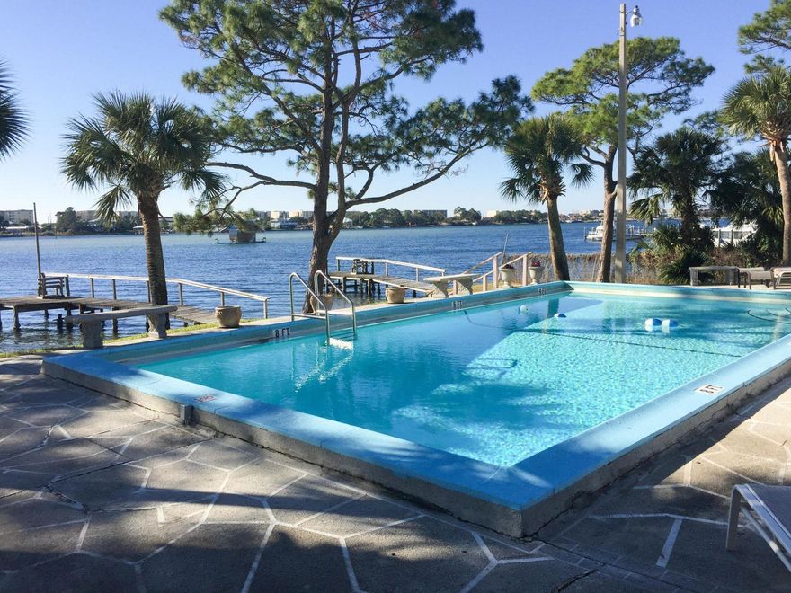 Perfectly located in the heart of Ft. Walton beach this spacious 1,224 sq. ft., 2 bedroom 2 bath, townhouse is located South of hwy 98 on the Intracoastal Waterway front project, Casa Del Mar. Town-homes in this project rent from $1,100 - $1,400 per month.
The exterior of Casa Del Mar has recently been upgraded with a new roof ('15 w/ 20 yr warranty), paint ('17), and parking lot was recently resurfaced and painted ('16). Complex also has a beautiful waterfront pool and patio, grassy lawn for picnics, & two private docks for fishing/boating. Unit comes with 2 assigned parking spaces.